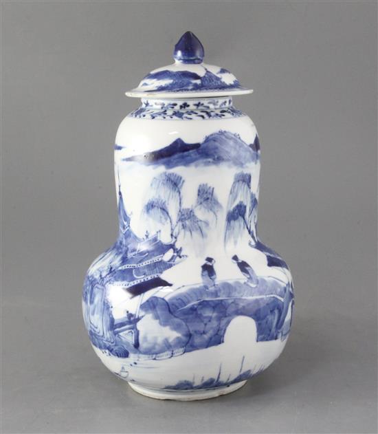 A Chinese blue and white gourd-shaped vase and cover, late 19th century, height 28cm